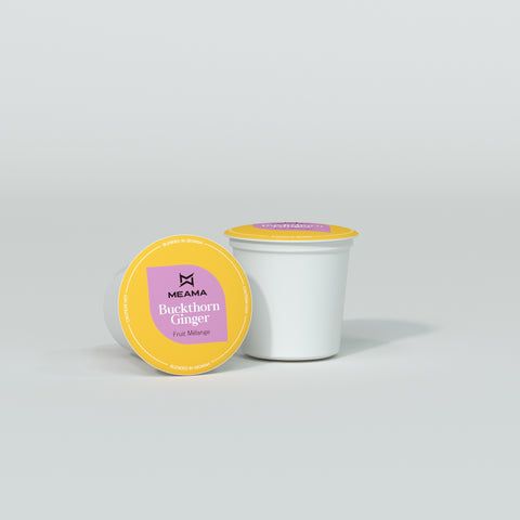 Zwei Multi-Tee-Kapseln der Sorte Buckthorn Ginger auf weißem Hintergrund