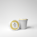 Zwei Multi-Tee-Kapseln der Sorte Ginger Mint auf weißem Hintergrund